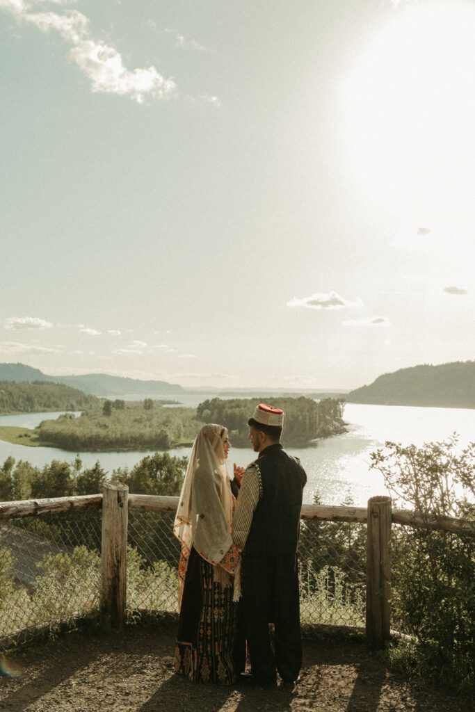 Outdoor engagement photos during sunset in the Columbia River Gorge Oregon. Couple wears traditional Palestinian and Syrian outfits