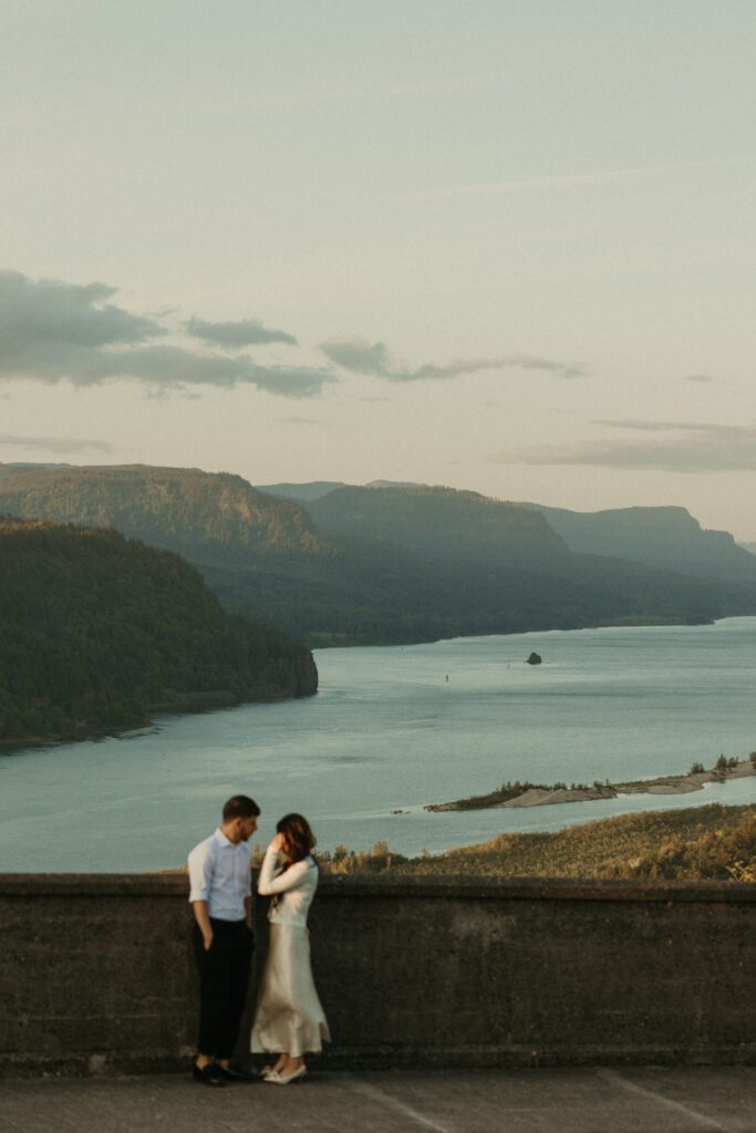 Sunset engagement photos near Portland Oregon. Views of the Washington side of the Columbia River from the Vista House